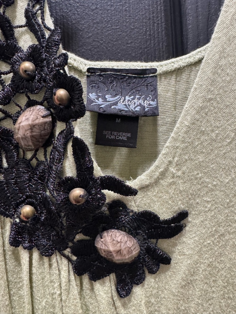 Daytrip Olive Green Top with Black Floral Applique and Taupe Buttons - Picture 2 of 3